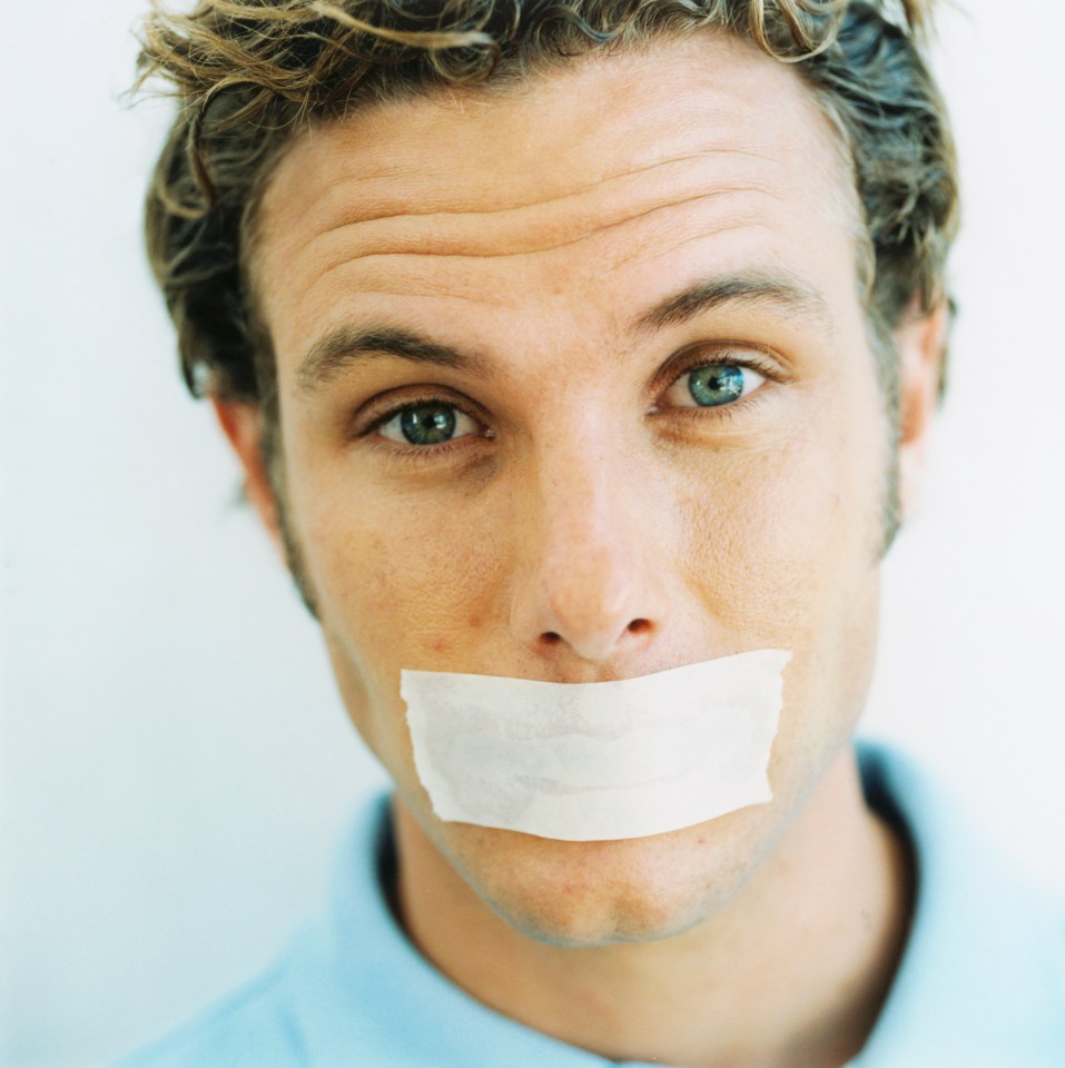 Man with tape over his mouth.