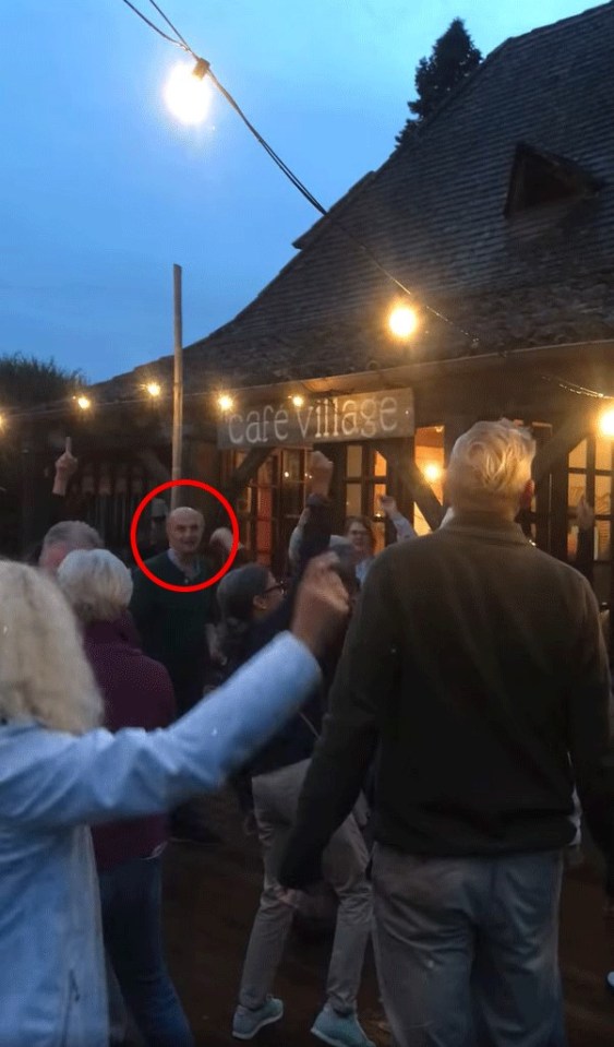 A woman dancing at a bar five months before her death.