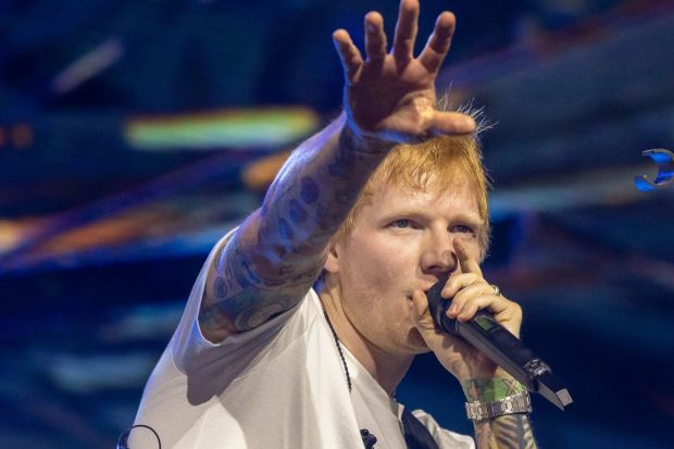 An image collage containing 1 images, Image 1 shows Ed Sheeran performing at Coachella, playing an acoustic guitar