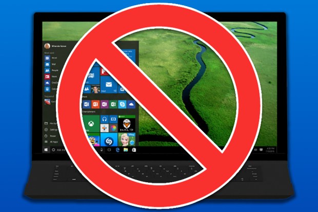 Laptop screen with a red prohibition sign over it.
