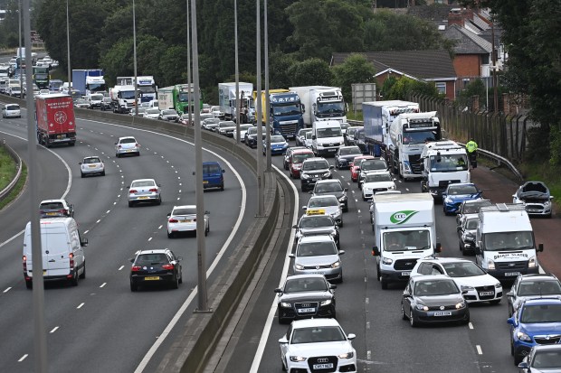 Traffic jam on a motorway due to a vehicle fire.