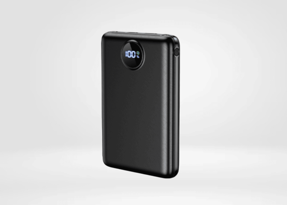 Black portable charger with a digital battery indicator.