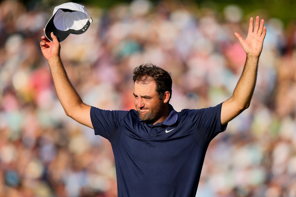 Scottie Scheffler celebrates winning the PGA Championship.