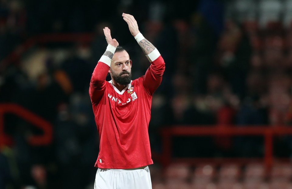 Steven Fletcher of Wrexham AFC applauding after a victory.