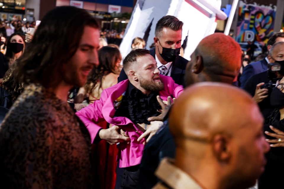 Conor McGregor and Machine Gun Kelly arguing at the MTV Video Music Awards.