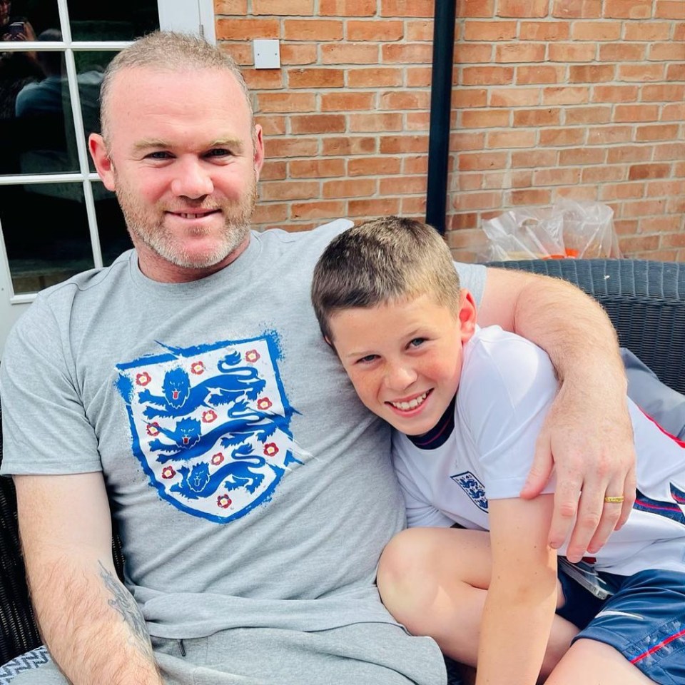 Wayne Rooney and his son Kai celebrating an England win.