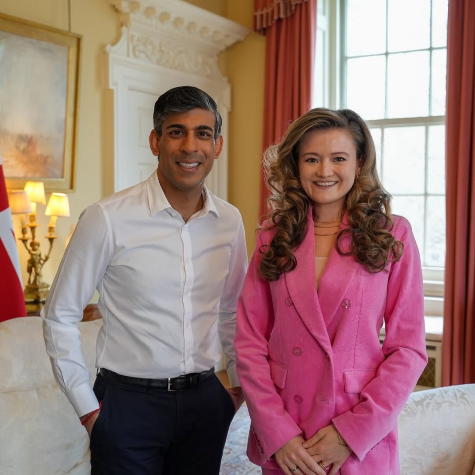 Portrait of Rishi Sunak and a woman in a pink blazer.