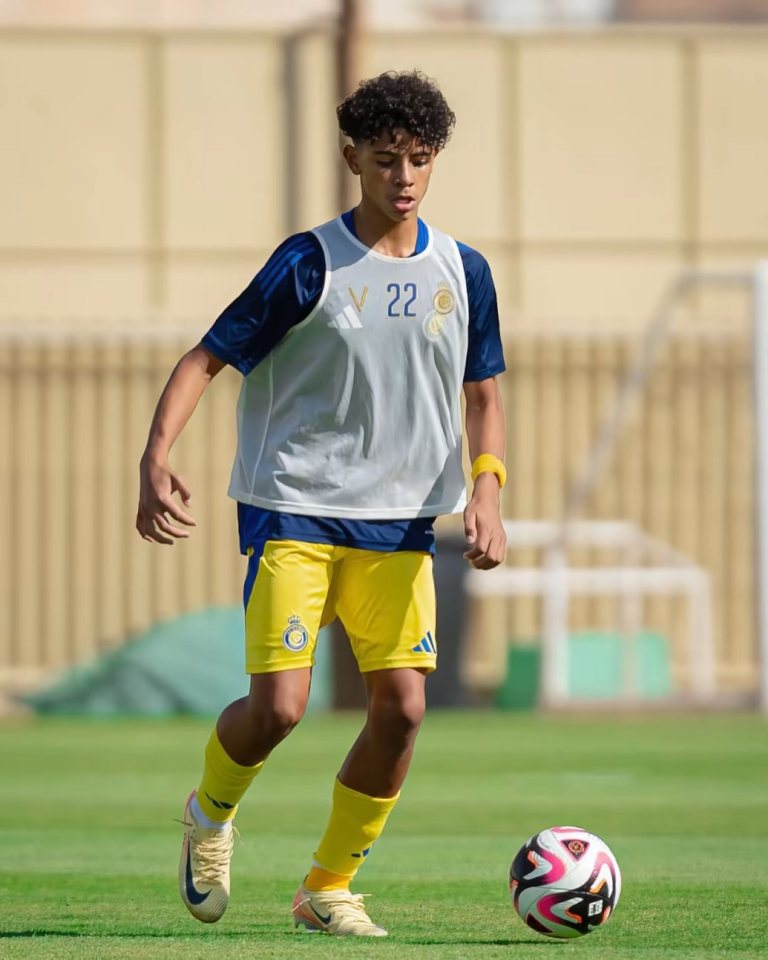 Cristiano Ronaldo Jr. playing soccer.