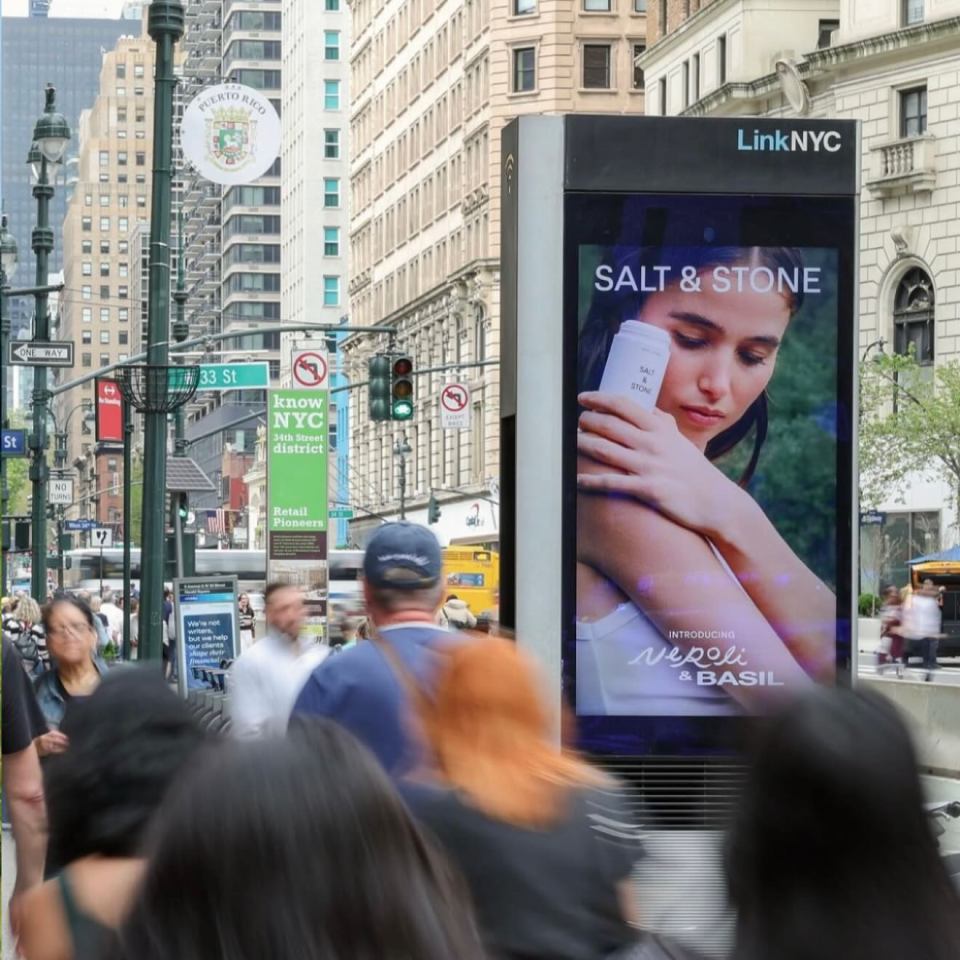 Salt & Stone deodorant advertisement on a LinkNYC kiosk.