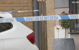 Police tape at a crime scene.