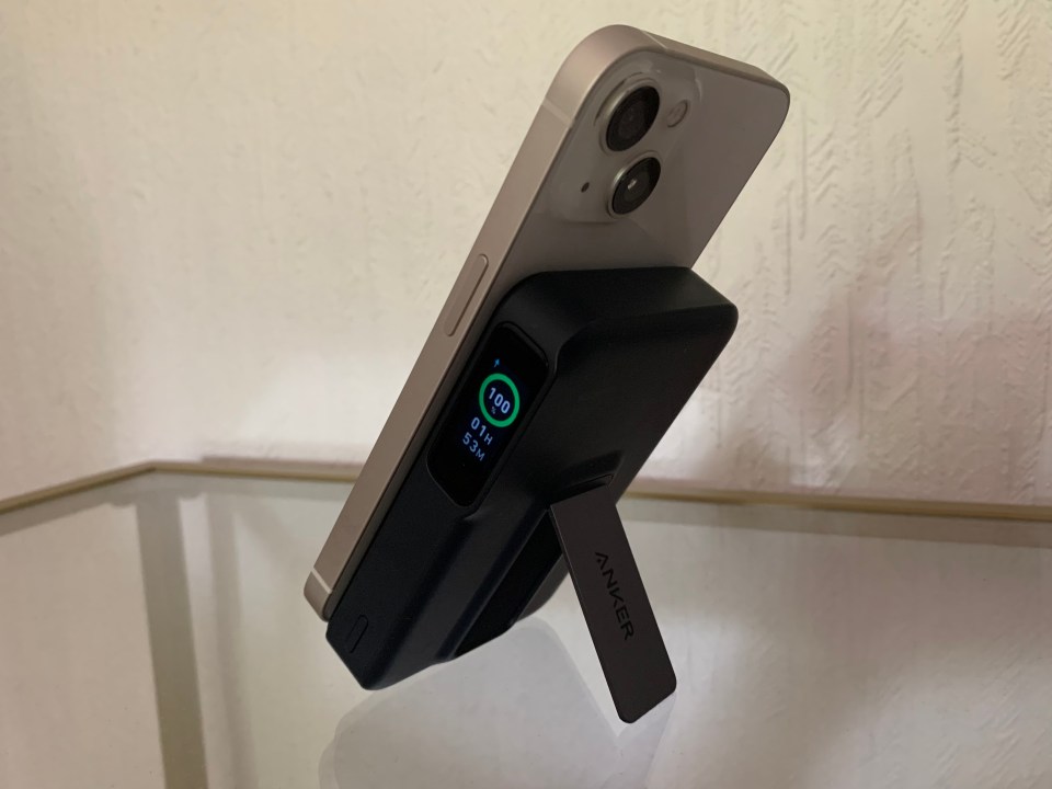 Anker MagGo charger with iPhone and Apple Watch charging.