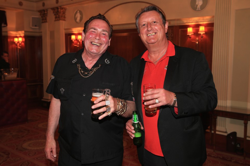 Bobby George and Eric Bristow, former darts players, at a charity fundraiser.