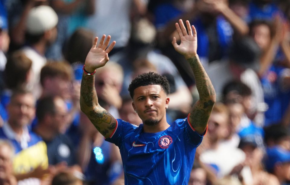 Jadon Sancho of Chelsea waving to fans.