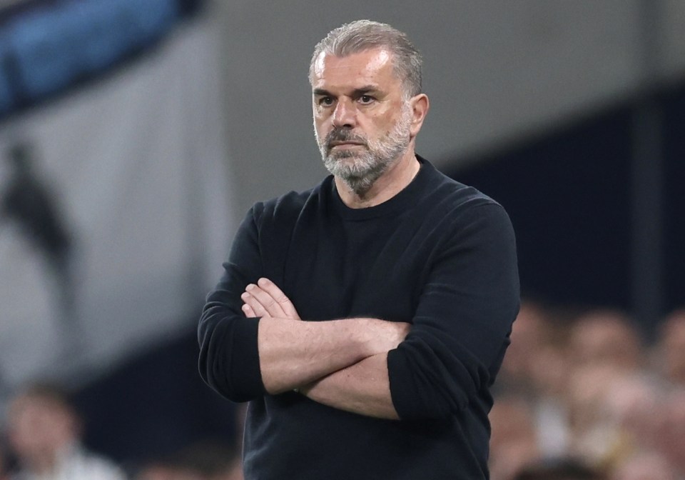 Ange Postecoglou, Tottenham manager, with arms crossed.