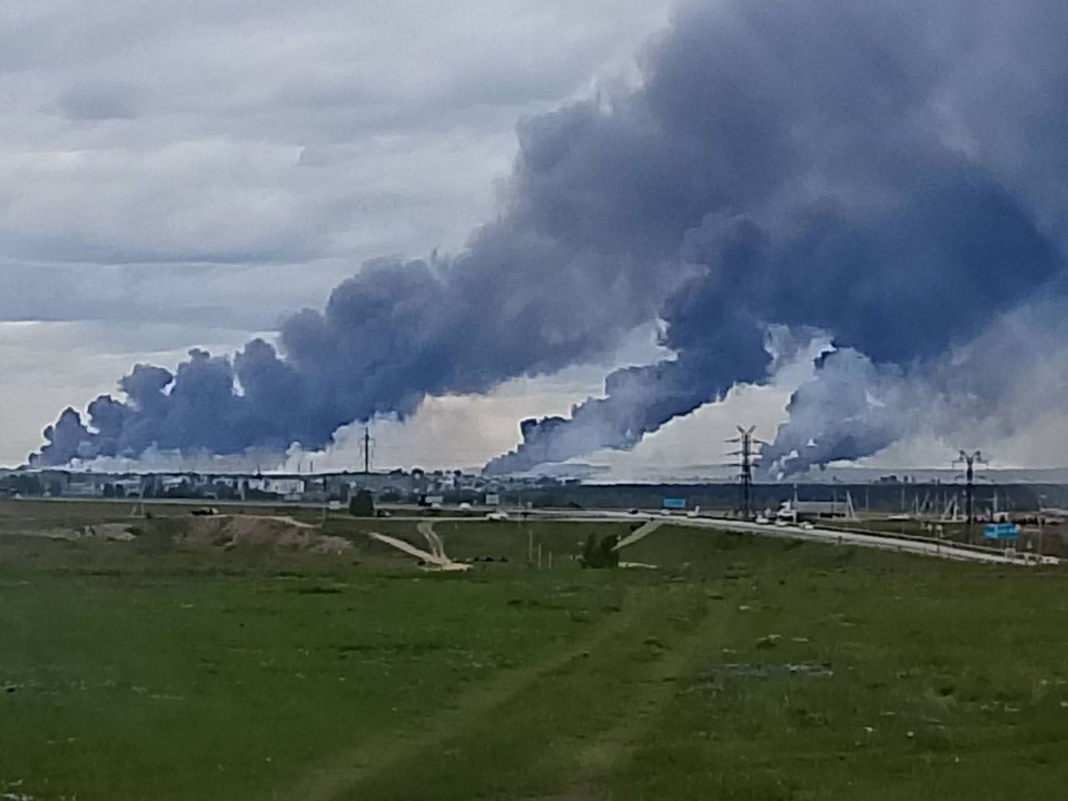 Large plumes of black smoke rising from an industrial area.