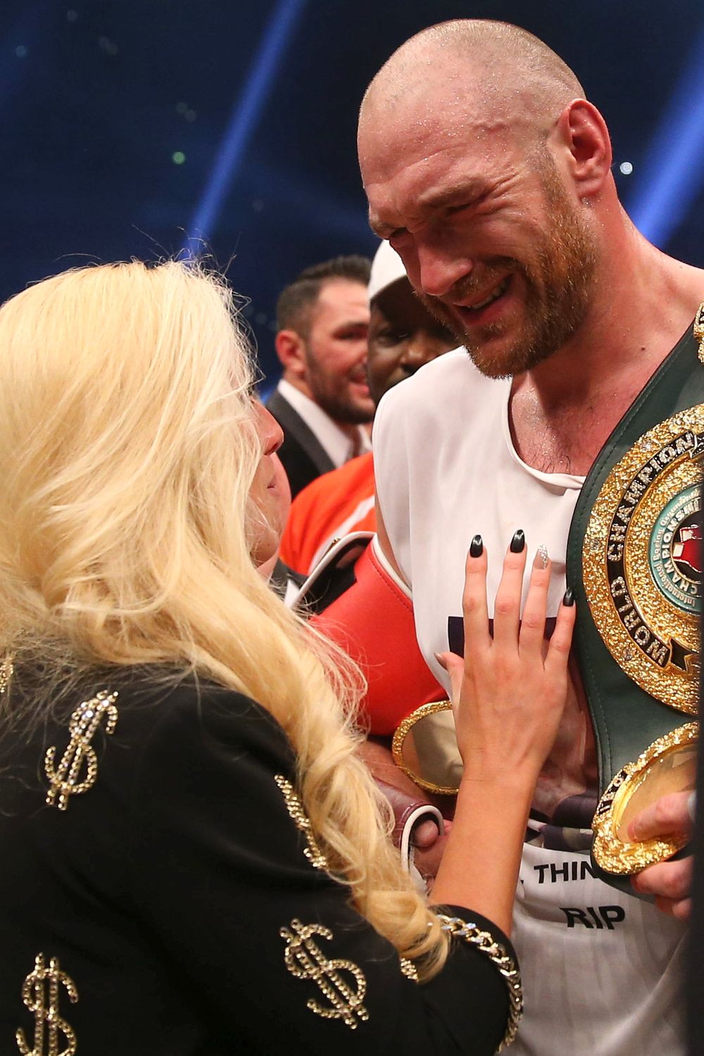 Paris Fury congratulates her husband after the fight