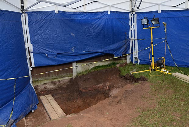 Undated handout photo issued by Nottinghamshire Police of the unmarked grave in the back garden of the Wycherley's former home where the victims had lain buried about a metre underground and undiscovered for 15 years, as Susan and Christopher Edwards have been found guilty at Nottingham Crown Court of murdering her parents, whose bodies were found buried in their own back garden 15 ye