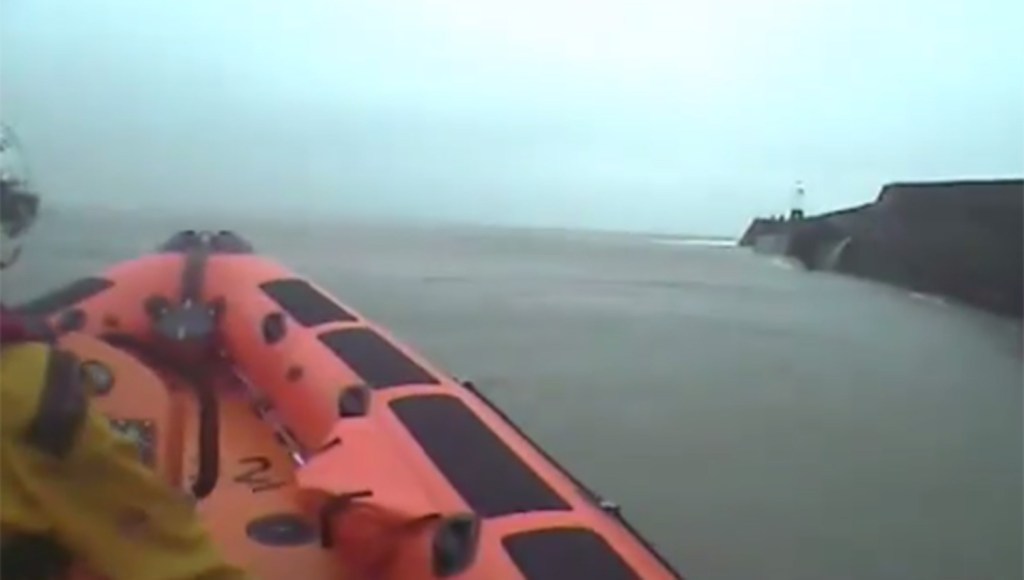 Mike Dooley almost drowned after he was swept into the sea while fishing in Porthcawl, Wales