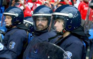 Riot police were sent in to form a human barrier between rival fans