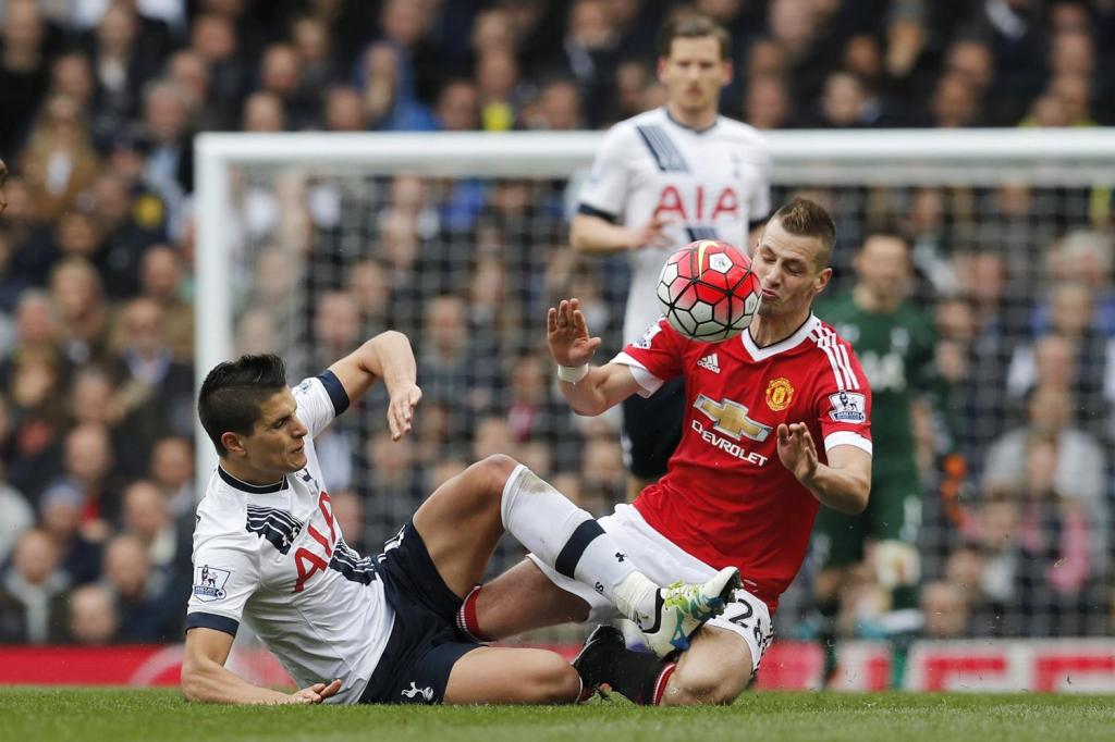The France midfielder clashes with Tottenham's Erik Lamela
