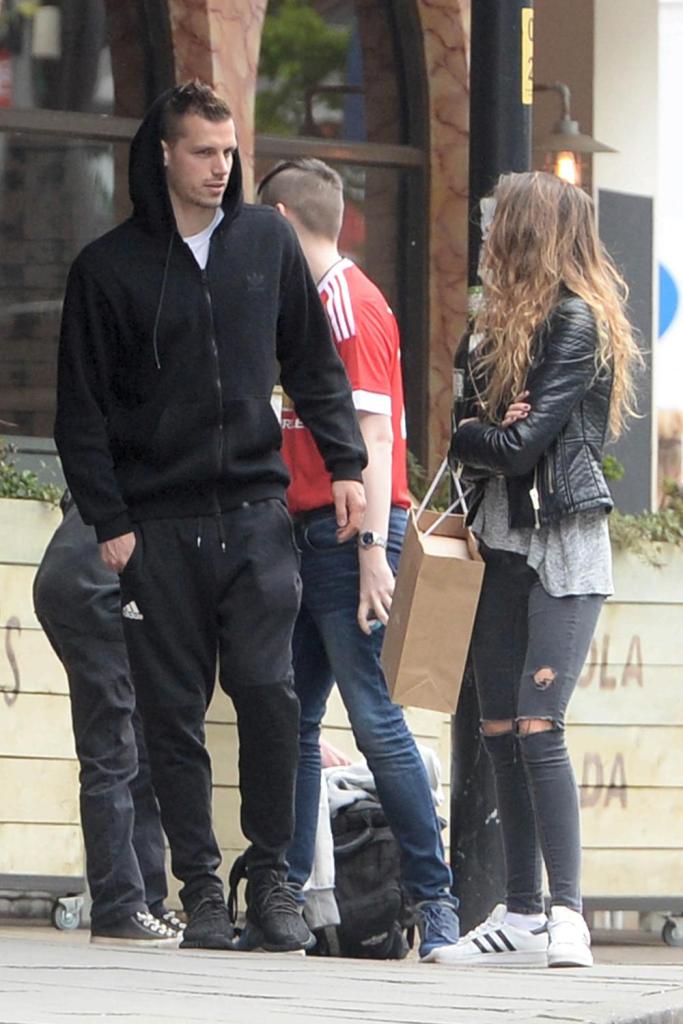 Schneiderlin and Camille stop as a Manchester United fan approaches