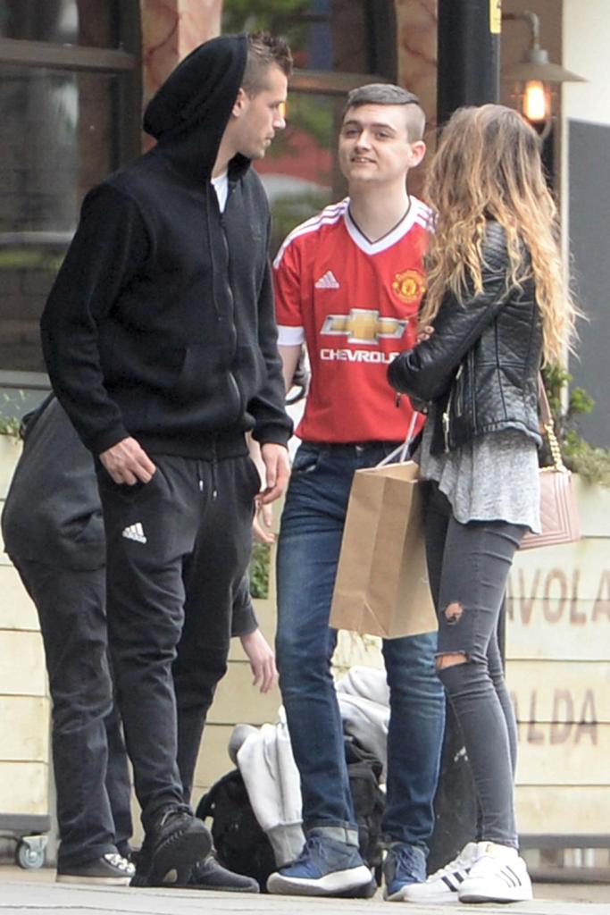 Schneiderlin chats to the Red Devils supporter in the street