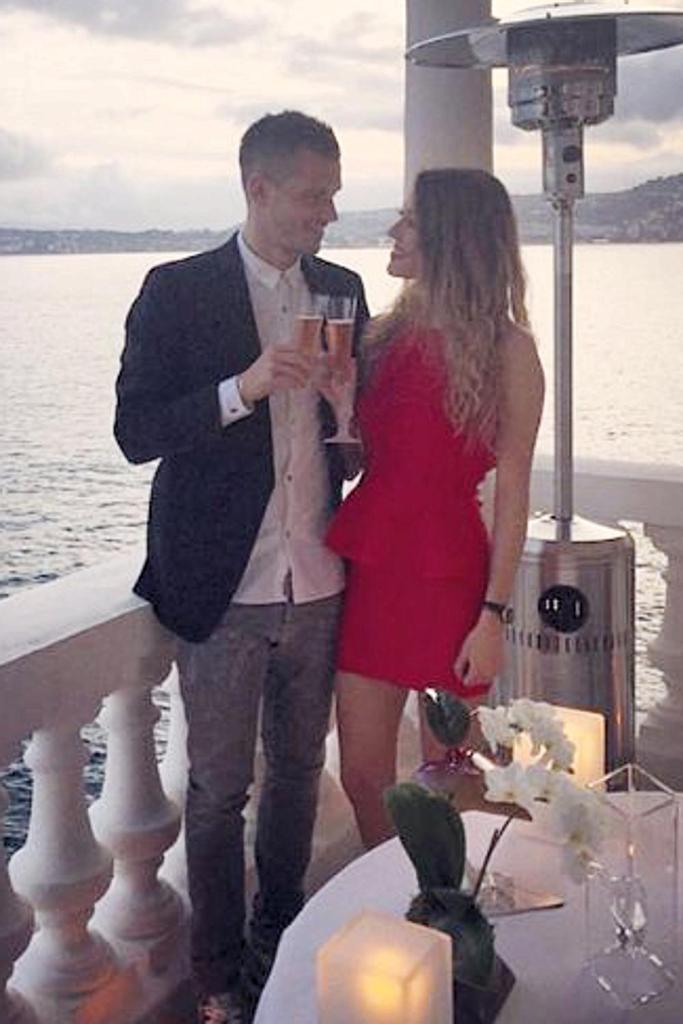 The happy couple toast to their engagement in March