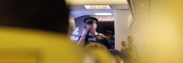One of the officers spoke to passengers via the plane's intercom before the stag was kicked off the flight