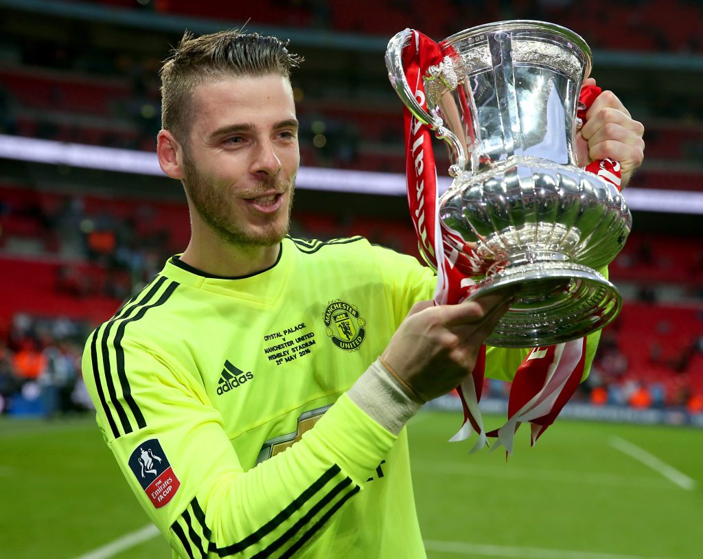 Triumphant David De Gea lifts the FA Cup after United's win over Crystal Palace