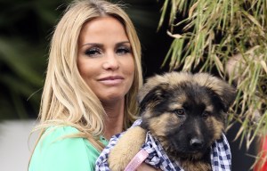 Katie Price heads home with cute pup Queenie