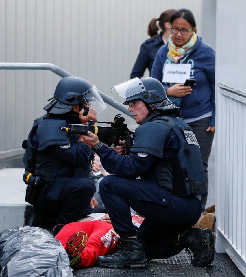 French Police forces take part in a mock attack drill outside the Grand Stade stadium in Decines