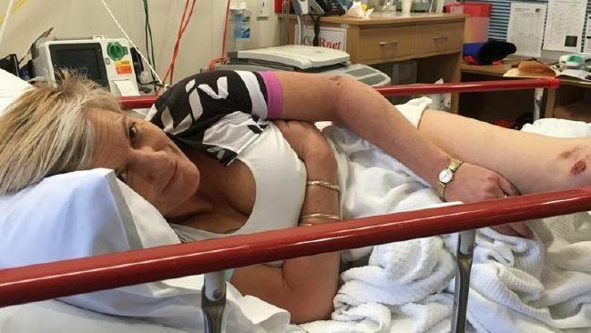 Sharon Heinrich, 45, was on the Riesling Trail in the Clare Valley with her friend when the 'cute' kangaroo jumped from an embankment and landed on her