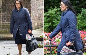 Pro Brexit minister taunts David Cameron with copy of The Sun as she enters Downing Street