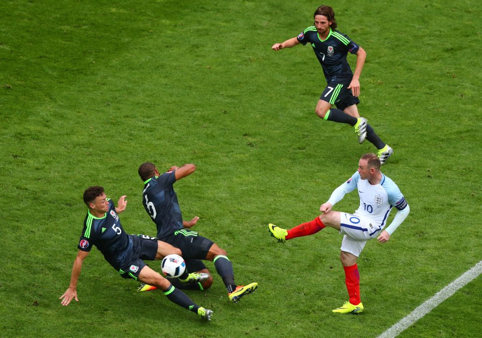 Skipper Rooney lets fly as England recovered from a goal down to beat Wales 2-1