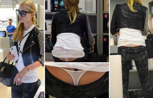 Paris Hilton flashes her bum as she suffers embarrassing wardrobe malfunction