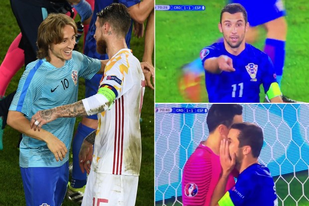 Luka Modric appears to tip off Darijo Srna as to where Sergio Ramos will hit his penalty