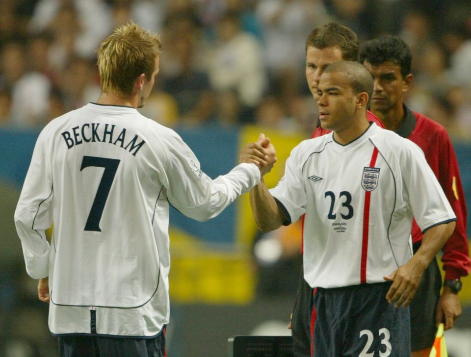 Kieron Dyer, pictured with David Beckham at the 2002 World Cup, played 33 times during his England international career between 1999 and 2007