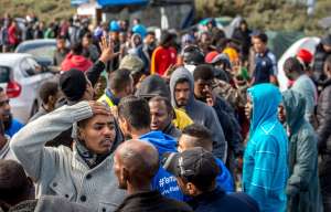 Warm weather and beefed up security in Calais will see migrants trying to SWIM to Britain