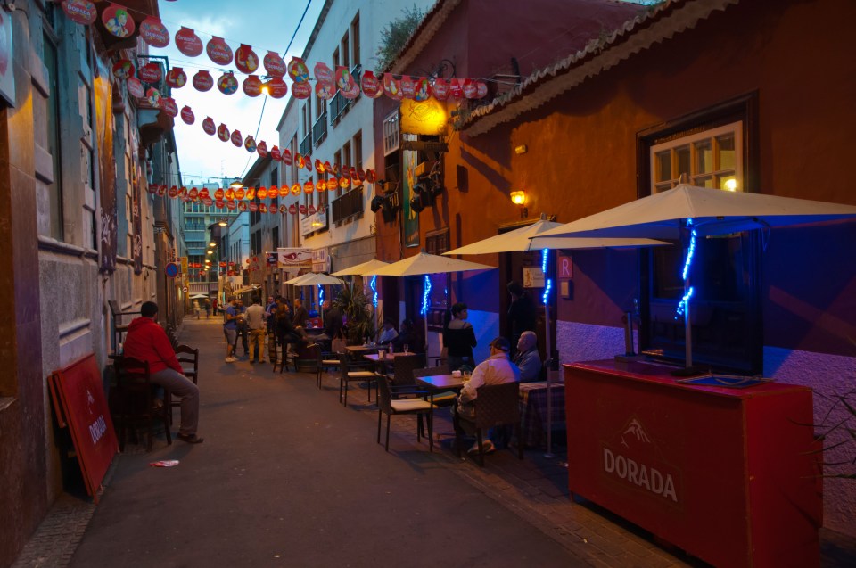 Bar terraces alogn El Clavel street during the carnival Santa Cruz city Tenerife island Canary Islands Spain