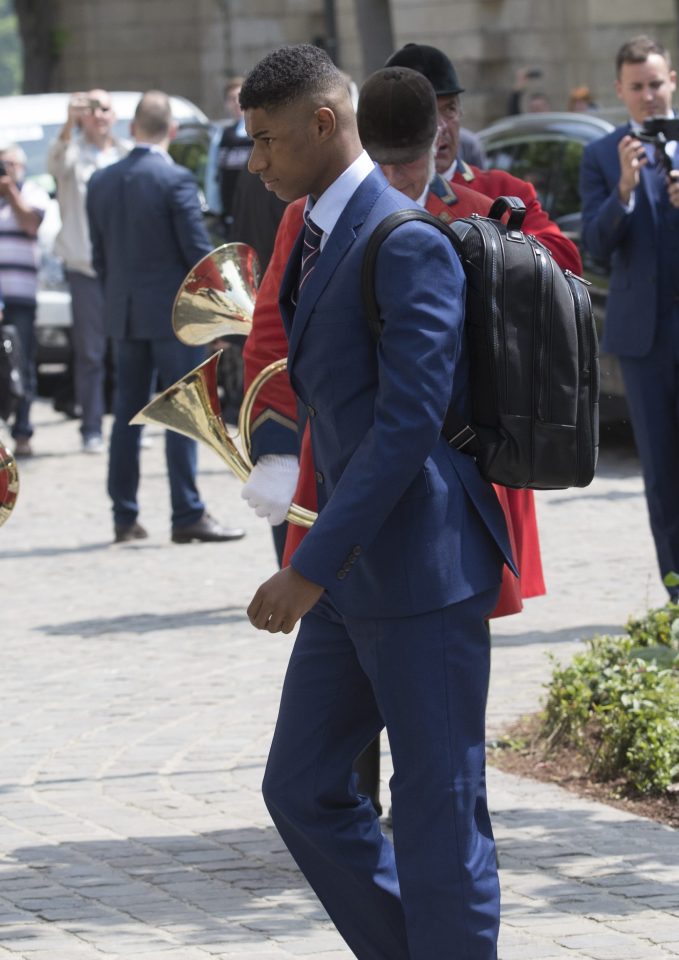 Marcus Rashford traditionally would have had to look after the lion but his Manchester United team-mate Chris Smalling did so on this occasion