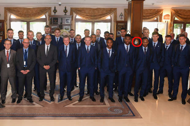 Chris Smalling sneaks the unnamed toy lion mascot into an England squad photo