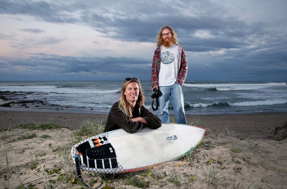 Photographer Nathan McLaren who took the amazing shark snap and surfer Daniel Caban who shared the waters with the big fish