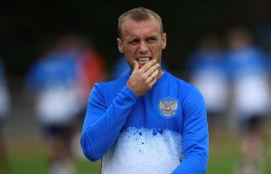 Denis Glushakov makes a gesture during training today before his physio session