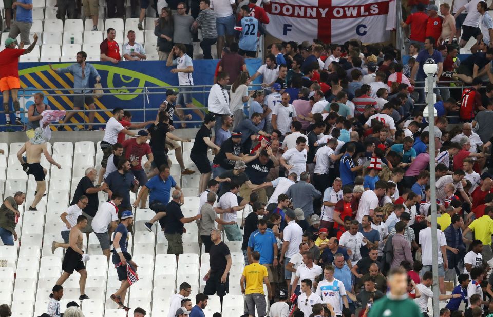 Russian hooligans charge at England fans in Marseilles clashes