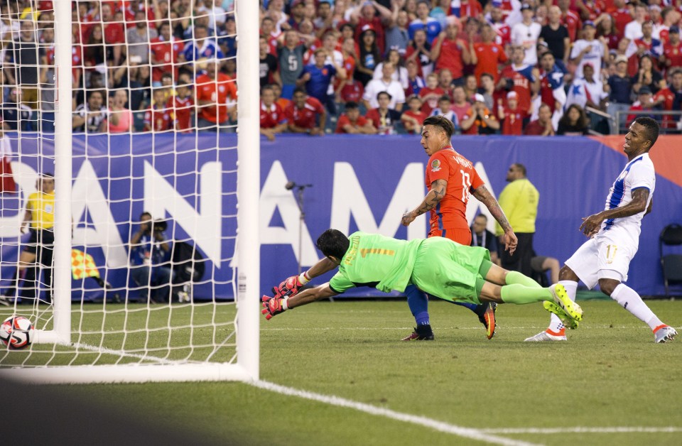 Jun 14, 2016; Philadelphia, PA, USA; Chile forward Eduardo Vargas (11) scores past Panama goalkeeper Jaime Penedo (1) and defender Luis Henriquez (17) during the first half in the group play stage of the 2016 Copa America Centenario at Lincoln Financial Field. Mandatory Credit: Bill Streicher-USA TODAY Sports
