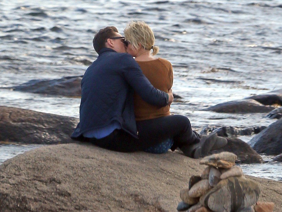 Taylor Swift passionately kisses new love Tom Hiddleston on the rocks in Rhode Island 
