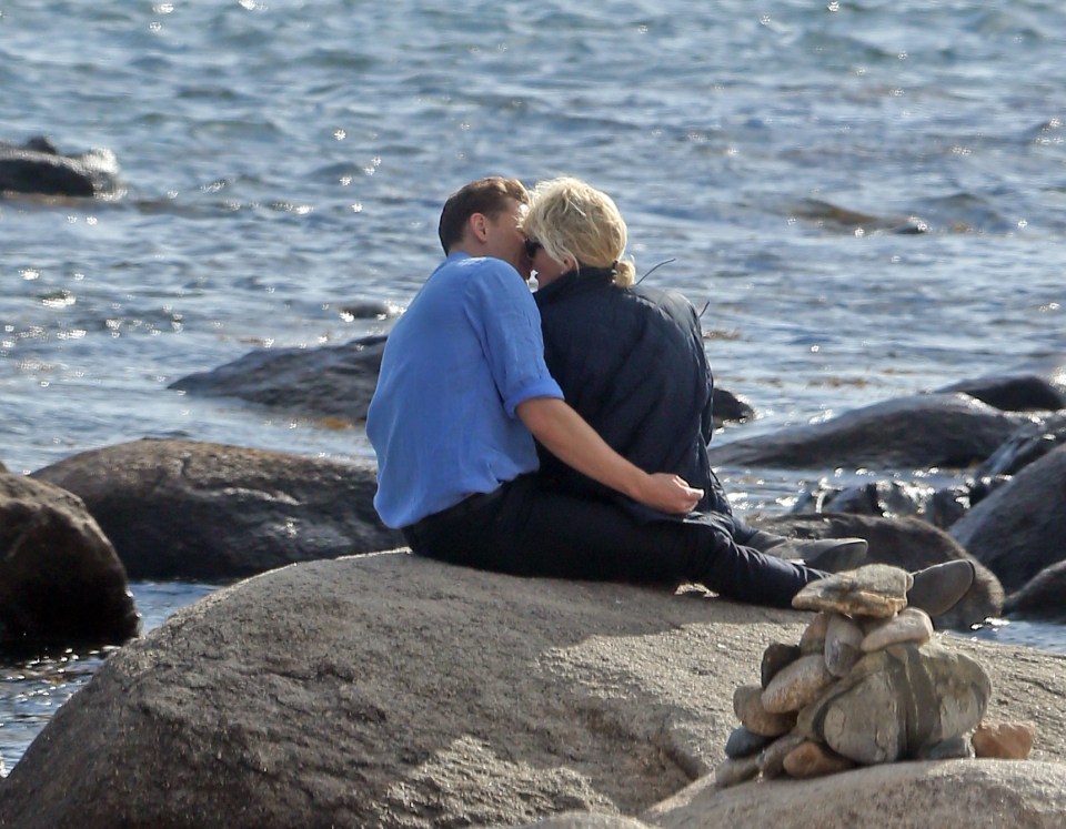 Taylor Swift passionately kisses new love Tom Hiddlestone in a romantic spot on the rocks of one of her favourite beaches 