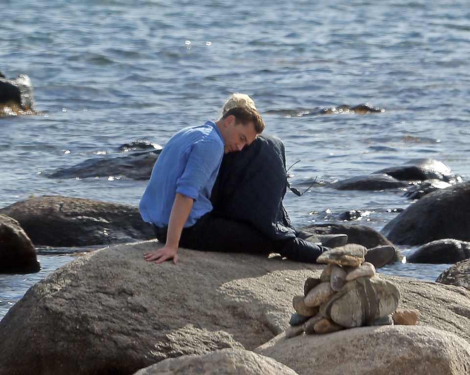 Tom Hiddlestone looks reflects on the special moment leaning his head on new girlfriend Taylor Swift's shoulder 