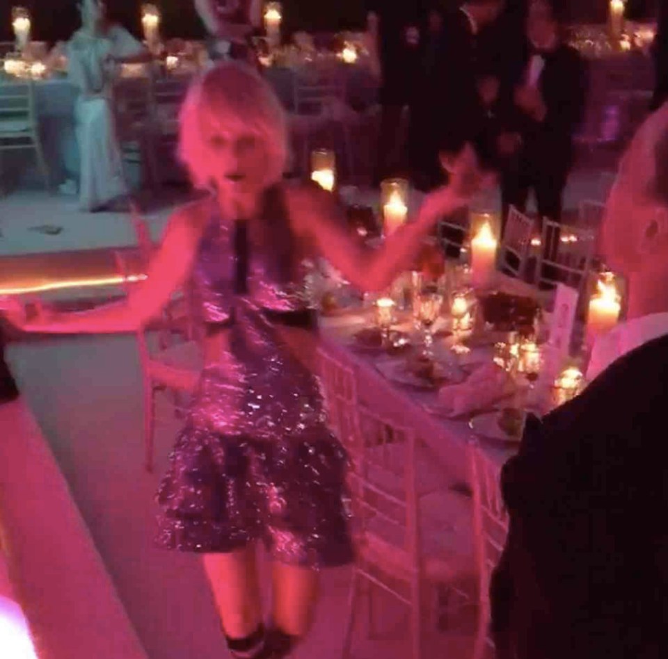 Taylor Swift is beaming as she shows Tom Hiddlestone her moves at The Met Ball in May 
