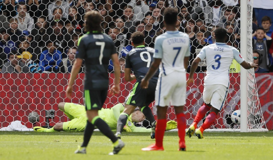 Joe Hart watches Gareth Bale's free-kick squirm from his grasp into the corner